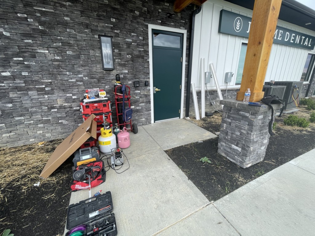 Pierce LLC setting up equipment for HVAC installation in Plain City, OH